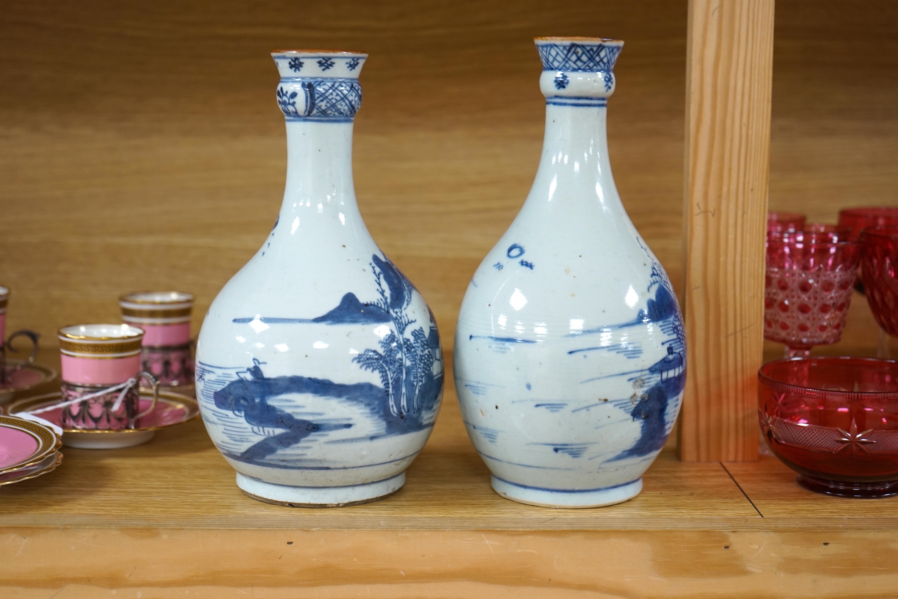 Two Chinese blue and white guglet bottles, 18th century, tallest 24cm high. Condition - good